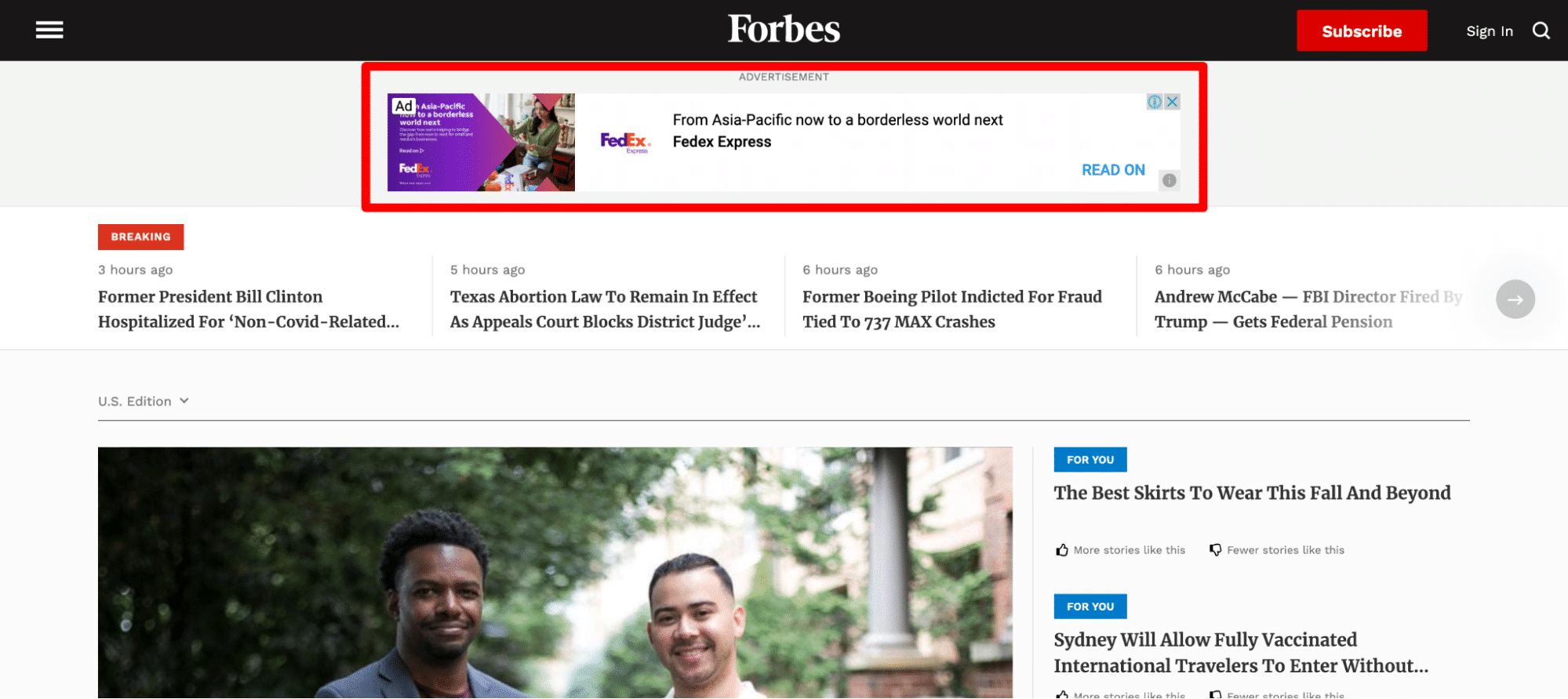 The Forbes homepage with a banner ad boxed in red
