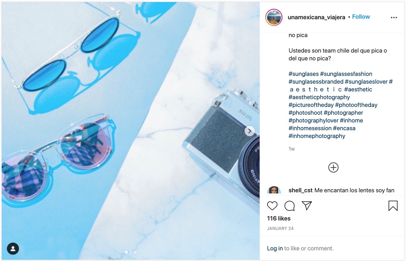 Instagram post with a photo of sunglasses and a camera with the hashtag #photography