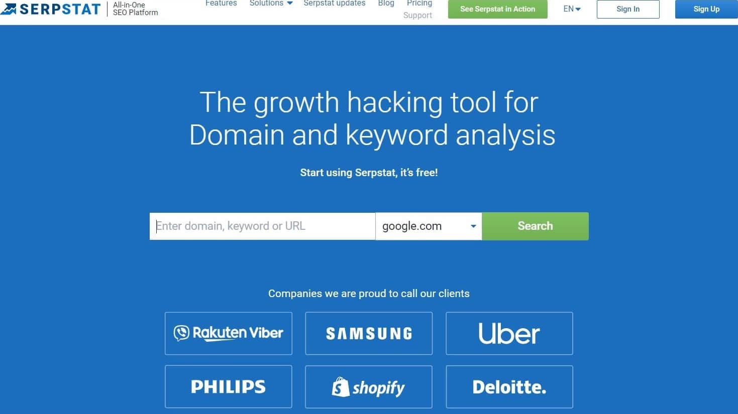 The Serpstat homepage with a search bar and the tagline "The growth hacking tool for Domain and keyword analysis".