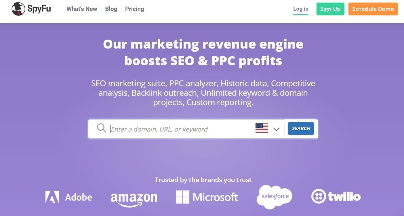 The SpyFu homepage with the tagline "Our marketing revenue engine boosts SEO & PPC profits".