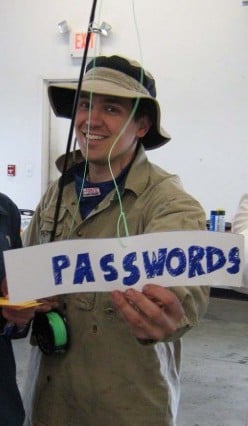 Email phishing Halloween costume with fishing rod with Passwords label as bait