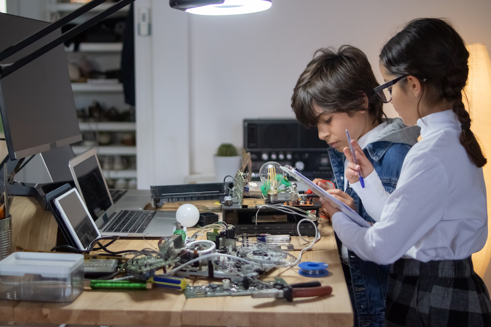 Nerd kids with computers