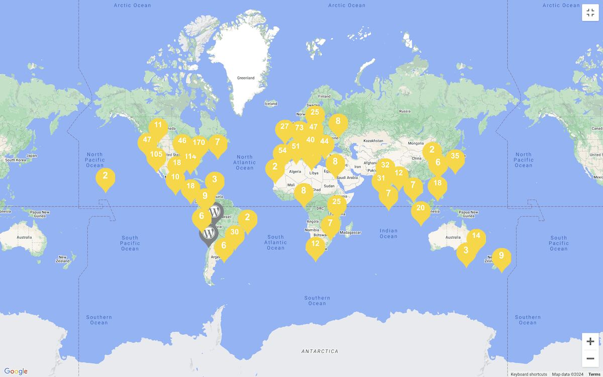 A world map displaying yellow markers with numbers, indicating the locations of WordCamps across different countries and continents. The map shows a concentration of markers in North America, Europe, and parts of Asia.