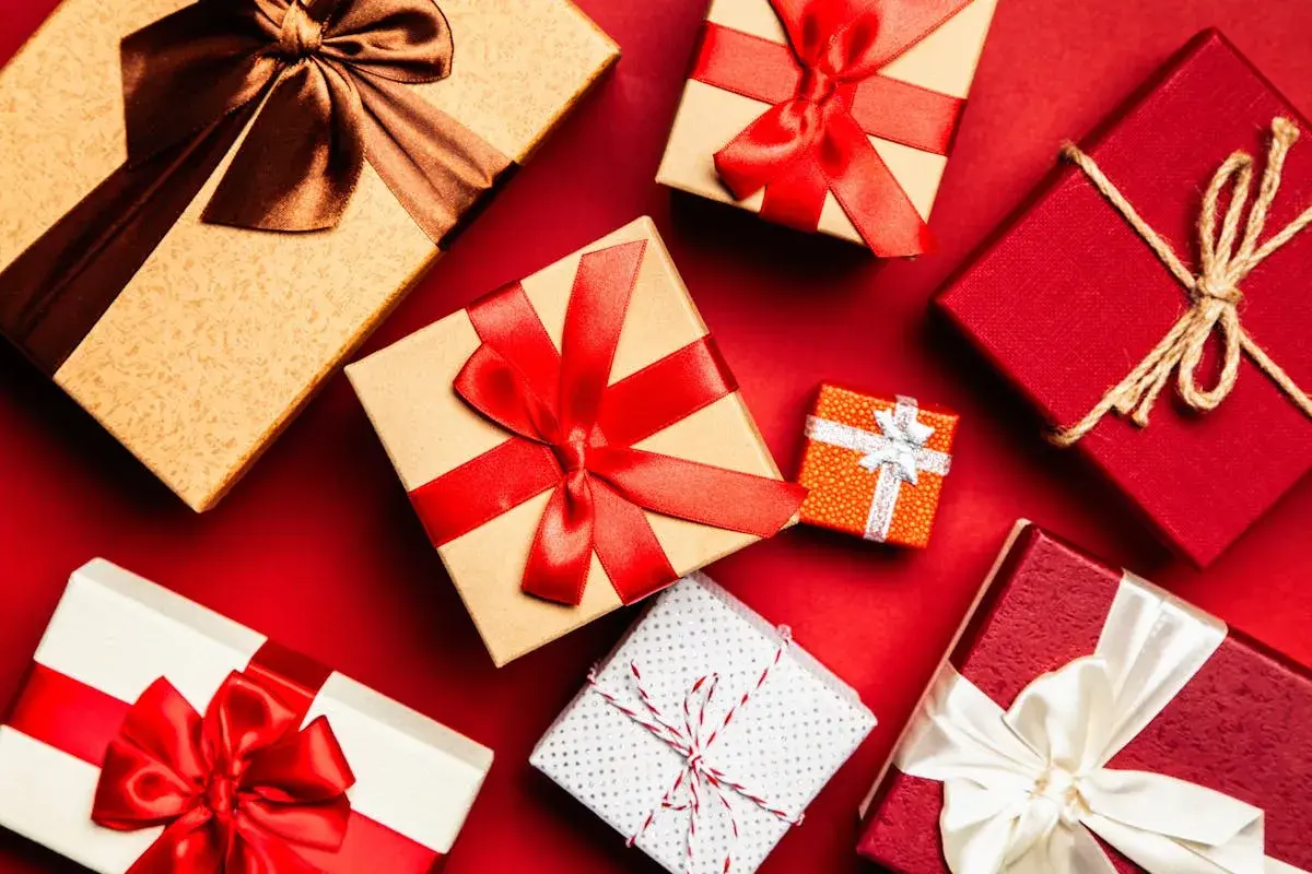 boxed gifts zoom background for holiday seasonhttps://www.pexels.com/photo/assorted-gift-boxes-on-red-surface-1666065/